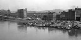 Dredge CENTRAL is docked along with several other Dredges on May 9, 1932.  Photo from collection of Historic Pittsburgh