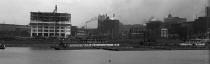 Picture showing the riverfront with CYCLONE DIGGER on right side.  From collection of Historic Pittsburgh dated 1912