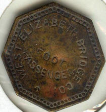 From collection of Jeremy Stieh, Front of "Tug AID" token