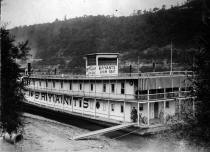 Picture of Bryant Showboat listed as being taken at Elizabeth, PA.  The location might be West Elizabeth as this is where the boat tied up during the winter for several years.  The date given of  November 14, 1928 must be date of story line and not when the photo was taken because of the appearance of leaves on the trees indicating spring or summer weather also the dress of individuals shown is light weight.