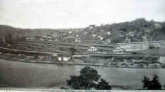 Monessen Steel Mill 1907 with homes on the hillside above it.