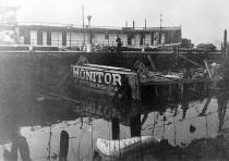 This photo is not from the same collection but shows the wreck of the MONITOR after partial dismantling